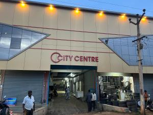 a city centre building with people walking outside of it at City Centre in Coimbatore