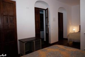 Łóżko lub łóżka w pokoju w obiekcie Fuentepiedra Casa Rural Categoría Superior