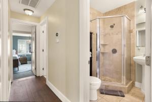 a bathroom with a shower and a toilet at 4 bedroom Private House in central Chico in Chico +36 photos
