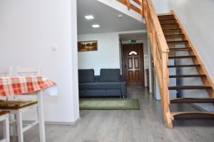 Posezení v ubytování Föveny Apartmanok