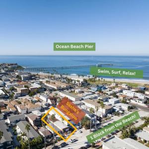 an aerial view of the ocean beach pier and the ocean beach jetominium at 2BD Sashas Bungalow Beach Vibes 1 Block Away in San Diego