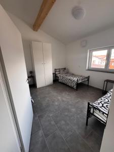 Postel nebo postele na pokoji v ubytování Bade Homes