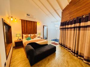 Postel nebo postele na pokoji v ubytování Palmyra Nature Resort Sigiriya
