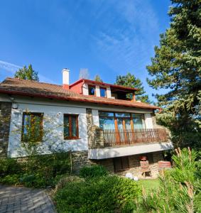 an image of a house with a balcony at Hanga Vendégház in Tihany +17 photos