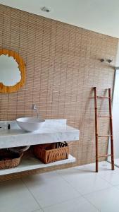 Um banheiro em Casatua Pousada