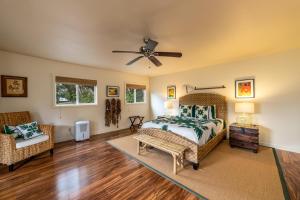 Postel nebo postele na pokoji v ubytování Iokua Hale