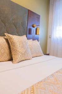 Postel nebo postele na pokoji v ubytování Moroccan Floors - Suites Appart-Hôtel