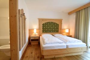 Un pat sau paturi într-o cameră la Cesa Setil