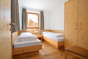 Postel nebo postele na pokoji v ubytování Cesa Setil