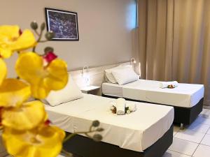 Postel nebo postele na pokoji v ubytování Hotel Econotel by Bsb Inn