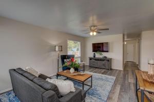 a living room with a couch and a table at Hilo Hale Kaumana in Hilo