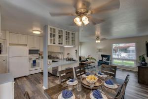 a kitchen and dining room with a table and chairs at Hilo Hale Kaumana in Hilo