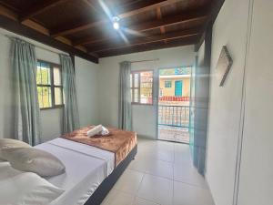 Fotografie z fotogalerie ubytování Las Casas de Tomate v destinaci Guatapé