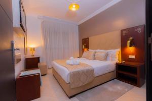 Postel nebo postele na pokoji v ubytování Moroccan Floors - Suites Appart-Hôtel