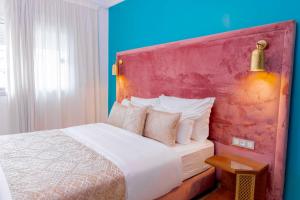 Postel nebo postele na pokoji v ubytování Moroccan Floors - Suites Appart-Hôtel