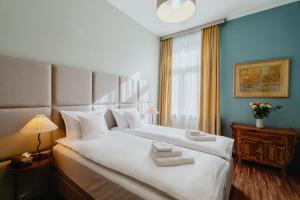 Voodi või voodid majutusasutuse Tarlowska - Free Parking - Near Castle, Main Square & River - 3 bedroom, loggia, 2xTV 4K toas