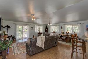 a living room with a couch and a table at Fern Forest Hale in Volcano