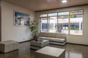 Posezení v ubytování Foz Central Budget Hotel