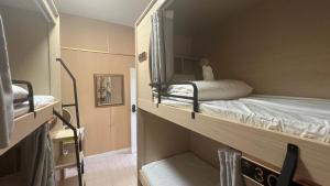 Postel nebo postele na pokoji v ubytování Golden mango home Youth hostel 金芒果之家青年旅舍 + 66 fotografií