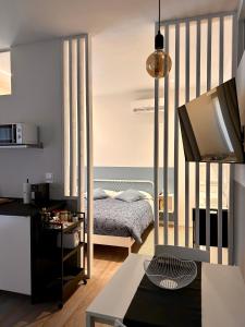 Postel nebo postele na pokoji v ubytování Suite Apartments - Corso51