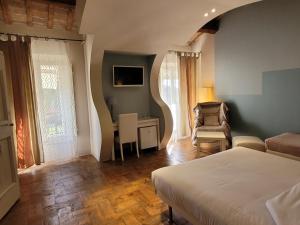Voodi või voodid majutusasutuse Relais Casetta56 toas