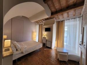 Voodi või voodid majutusasutuse Relais Casetta56 toas