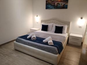 Postel nebo postele na pokoji v ubytování Nuova fiera camera