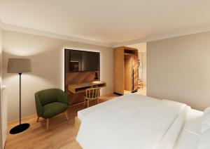 Postel nebo postele na pokoji v ubytování Gasthof Hummel Hotel