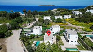 an aerial view of a house with a red sign on it at Villa Casa LUZ in Bodrum City