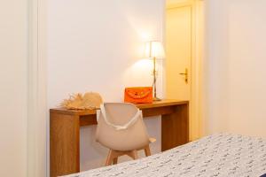 Postel nebo postele na pokoji v ubytování Hotel Villa Rita
