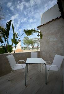 Balkón nebo terasa v ubytování Hostal del Faro