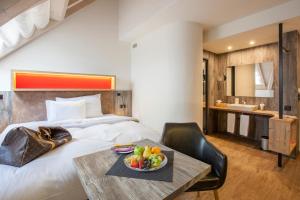 Voodi või voodid majutusasutuse Boutiquehotel Thessoni Classic & Self service Residence Home Zürich toas