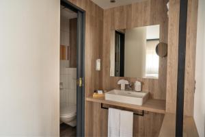 Vannituba majutusasutuses Boutiquehotel Thessoni Classic & Self service Residence Home Zürich