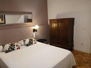 Posteľ alebo postele v izbe v ubytovaní Apartamentos "Casa Melé" 2, Parking privado opcional