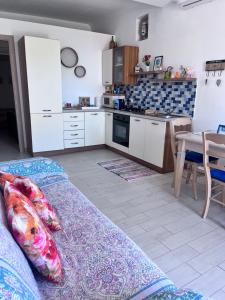 Kuchyňa alebo kuchynka v ubytovaní Appartamento ''Il sole'' + 21 fotografií