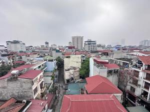 an overhead view of a city with buildings and roofs at The Little Hanoi - Cool Apartment - Lakeside in Hanoi