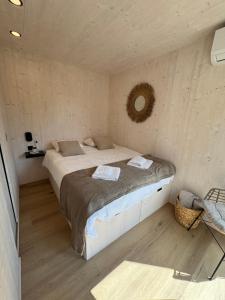 Prestige Beach & Wellness House客房内的一张或多张床位