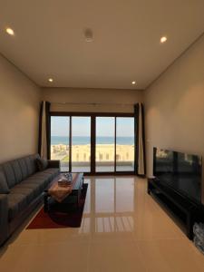 Posezení v ubytování Sifahbeachfront Apartment