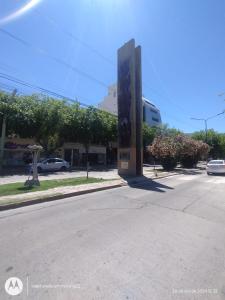 a sign on the side of a road with a street at Urbano B&B 2A in San Juan