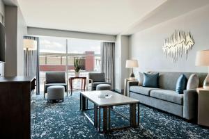 a living room with a couch and a table at The Westin Memphis Beale Street in Memphis