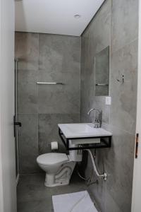 Koupelna v ubytování Hotel Pinheirinho + 9 fotografií