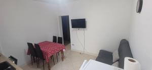 a living room with a table and a couch at Fazana SS in Fažana