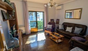 Khu vực ghế ngồi tại Apartamento El Parral +6 ảnh
