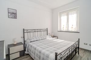 Postel nebo postele na pokoji v ubytování Il Vigneto