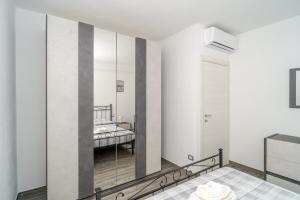 Postel nebo postele na pokoji v ubytování Il Vigneto
