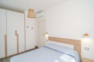 Postel nebo postele na pokoji v ubytování Il Vigneto