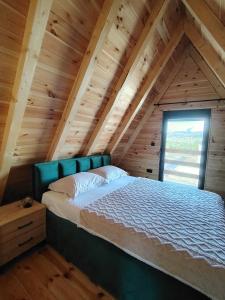 A bed or beds in a room at Durmitor sky
