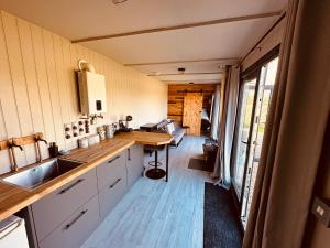 a kitchen with a sink and a counter top at Casterton stays in Tickencote