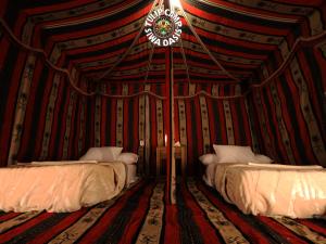 Postel nebo postele na pokoji v ubytování Tulip Camp Siwa Oasis