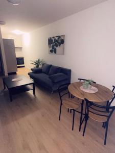 Et opholdsområde på Kőris Pool Apartments